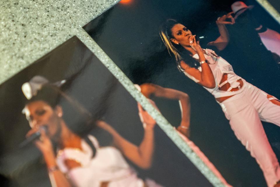 Photographs of a Beyoncé and Destiny's Child performance at the Celebrity Theatre in 1999 are displayed inside the HOT 97.5 & 103.9 studio in Phoenix on Aug. 15, 2023.