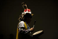 <p>Jordan Smith of the Mohawk Nation Bear Clan performs with the Longhouse Singers and Dancers representing the Oneida Nation at the Museum of the American Revolution in Philadelphia, Pa., Monday, Oct. 9, 2017. (Photo: Matt Rourke/AP) </p>