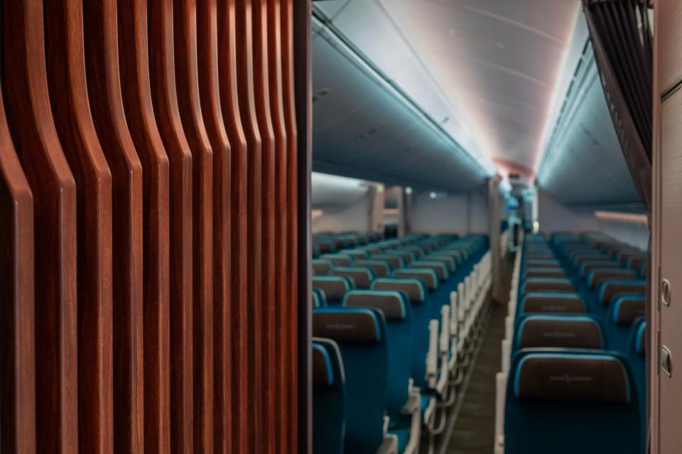 A view of Hawaiian Airlines new Boeing 787-9 Dreamliners' main cabin, with blue seating.