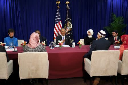 U.S. President Barack Obama (C) holds a roundtable with Muslim American community leaders at the Islamic Society of Baltimore mosque in Catonsville, Maryland February 3, 2016. REUTERS/Jonathan Ernst