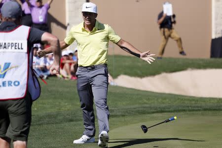 Apr 23, 2017; San Antonio, TX, USA; Kevin Chappell celebrates after sinking his last putt to win the Valero Texas Open at TPC San Antonio- AT&T Oaks Course. Mandatory Credit: Soobum Im-USA TODAY Sports