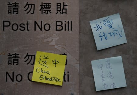 Notes against the proposed extradition bill are seen near the Legislative Council building in Hong Kong