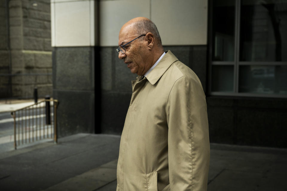 Former Philadelphia police detective Manuel Santiago leaves the Juanita Kidd Stout Center for Criminal Justice, Friday, April 5, 2024, in Philadelphia. Three long-retired Philadelphia police detectives, Martin Devlin, Manuel Santiago and Frank Jastrzembski, are accused of lying under oath at the 2016 retrial of a man the jury exonerated in a 1991 rape and murder. The case, if it proceeds to trial in November, would mark a rare time when police or prosecutors face criminal charges for flawed work that leads to wrongful convictions. (AP Photo/Joe Lamberti)