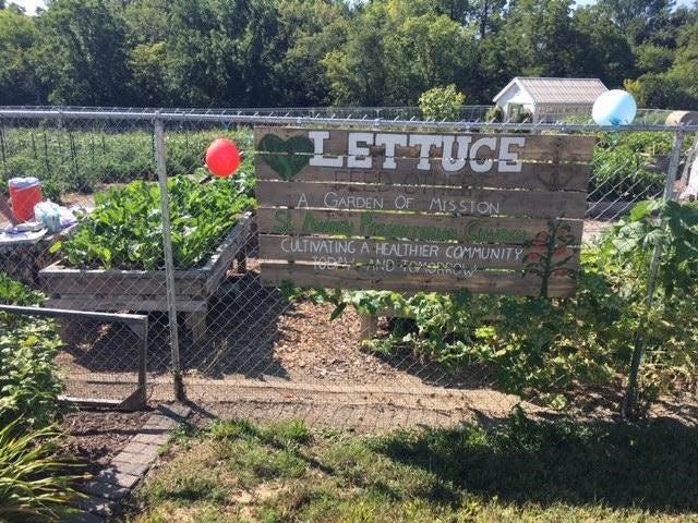 A community garden, worked by the community of St.  Andrew to serve the communities of Johnson County.