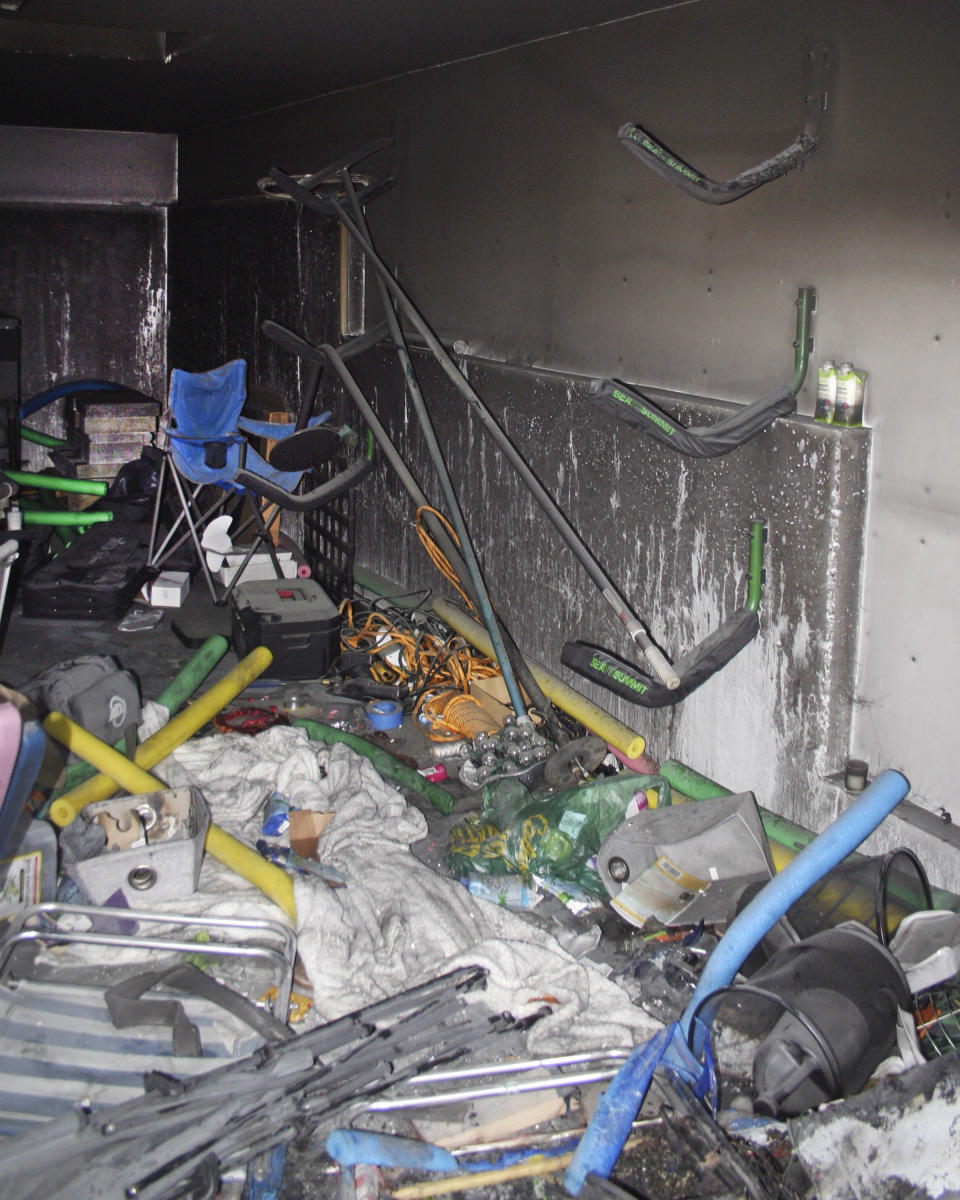 This photo, provided by the New London, Conn.,, Fire Department, shows fire damage inside a storage shed where Tony Hsieh, the retired CEO of the online shoe retailer Zappos died on Nov. 18, 2020. The cause of the fire that killed Hsieh could not be determined, a Connecticut investigator said in a report, Tuesday, Jan. 26, 2021. (New London Fire Department via AP)