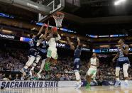 <p>Dylan Ennis #31 of the Oregon Ducks drives to the bsaket against E.C. Matthews #0 of the Rhode Island Rams during the second round of the 2017 NCAA Men’s Basketball Tournament at Golden 1 Center on March 19, 2017 in Sacramento, California. (Photo by Jamie Squire/Getty Images) </p>