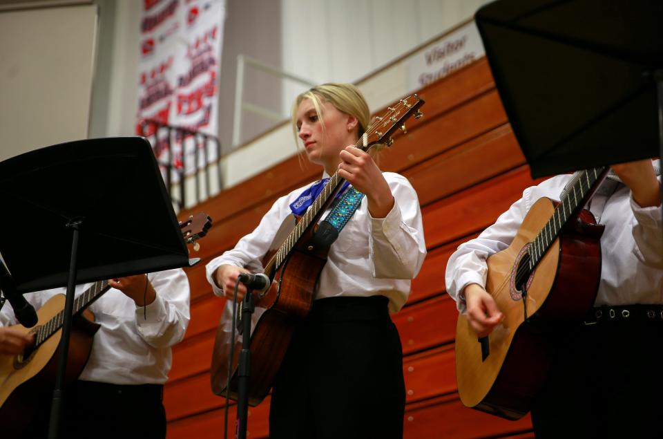 Members of the Denison High School mariachi ensemble perform.