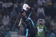 New Zealand's Tim Robinson follows the ball after playing a shot for boundary during the fourth T20 international cricket match between Pakistan and New Zealand, in Lahore, Pakistan, Thursday, April 25, 2024. (AP Photo/K.M. Chaudary)