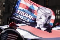 FILE - In this March 5, 2021, file photo protesters supporting former President Donald Trump march down Fifth Avenue on their way towards Times Square in New York. Trump ended his presidency with such a firm grip on Republican voters that party leaders fretted he would freeze the field of potential 2024 candidates, delaying preparations as he teased another run. Instead, many Republicans with national ambitions are openly laying the groundwork for campaigns as Trump continues to mull his own plans. (AP Photo/John Minchillo, File)