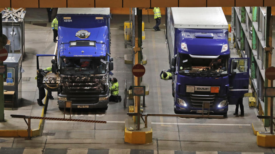 Lorries that arrived after the end of the transition period with the European Union are checked at the port in Dover, England, Thursday, Dec. 31, 2020. Britain left the European bloc’s vast single market for people, goods and services at 11 p.m. London time, midnight in Brussels, completing the biggest single economic change the country has experienced since World War II. (AP Photo/Frank Augstein)