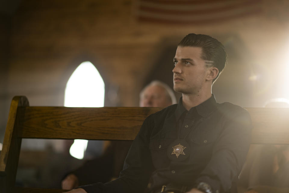 cop sitting in church