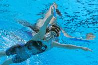 <p>An underwater view shows Japan's Yui Ohashi competing in the final of the women's 400m individual medley swimming event during the Tokyo 2020 Olympic Games at the Tokyo Aquatics Centre in Tokyo on July 25, 2021. (Photo by François-Xavier MARIT / AFP) (Photo by FRANCOIS-XAVIER MARIT/AFP via Getty Images)</p> 