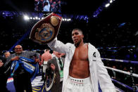 Boxing - Anthony Joshua vs Joseph Parker - World Heavyweight Title Unification Fight - Principality Stadium, Cardiff, Britain - March 31, 2018 Anthony Joshua celebrates after winning the fight Action Images via Reuters/Andrew Couldridge