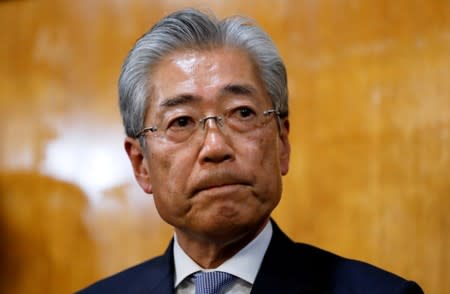 FILE PHOTO : Japanese Olympic Committee President Takeda looks on while addressing media in Tokyo