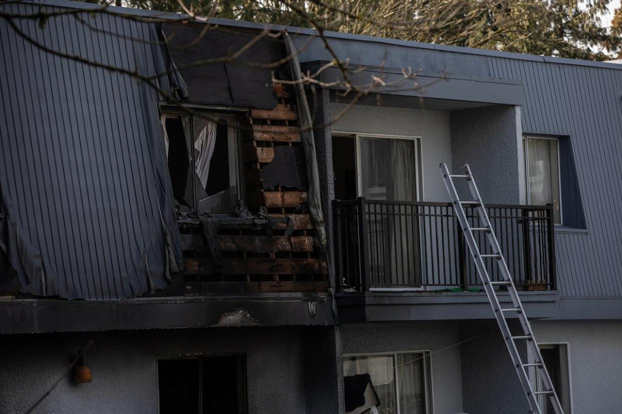 A fire tore through several units of an apartment building in Coquitlam, B.C., on March 7, 2024. (Nav Rahi/CBC - image credit)