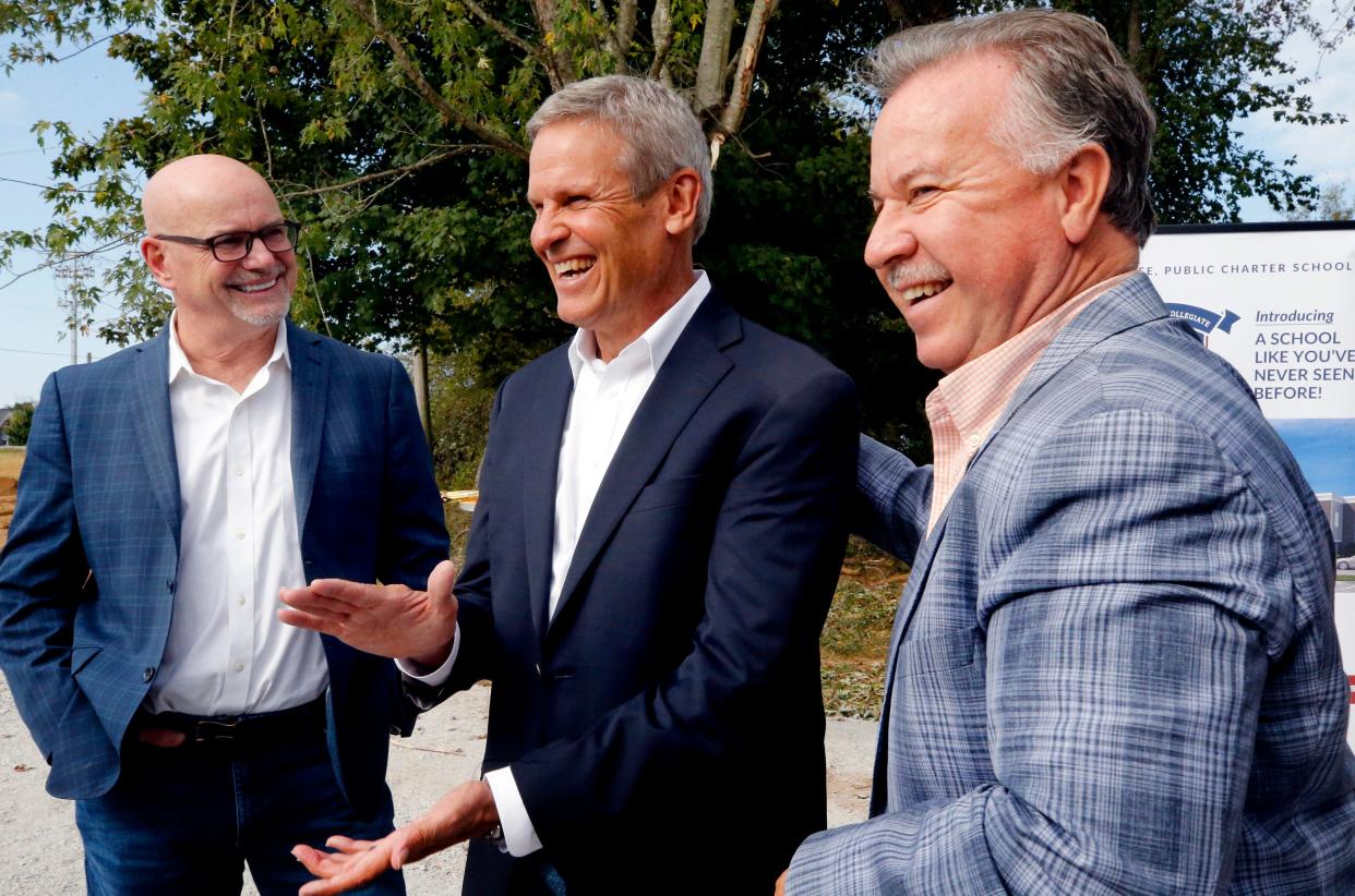 Tennessee Governor Bill Lee, middle shares a laugh with Daryl Macklin, the founder and Executive Director of A Soldier's Child, left and Mike Sparks, Tennessee State Representative, right, following the Rutherford Collegiate Prep (RCP) groundbreaking ceremony with Tennessee Governor Bill Lee, in Murfreesboro, Tenn. on Thursday, Oct. 12, 2023. This will be the first public charter school to be built in Rutherford County.