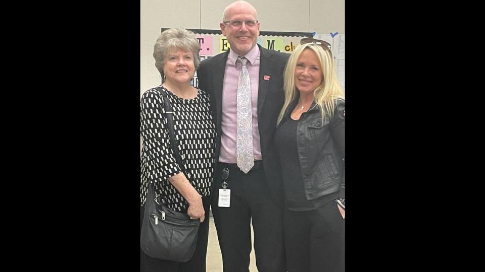 Sanger Unified’s incoming superintendent Dennis Wiechmann takes a picture with his mom Marsha Infausto (left) and his wife Erin Dolin-Wiechmann (right).