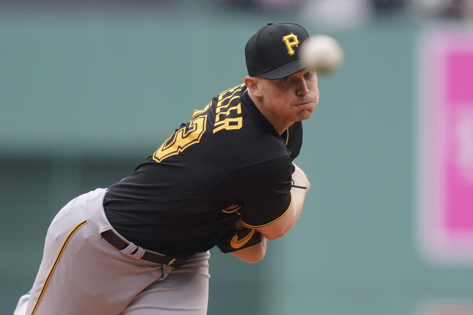Pittsburgh Pirates' Mitch Keller follows through on a pitch to a Boston Red Sox batter in the first inning of a baseball game, Wednesday, April 5, 2023, in Boston. (AP Photo/Steven Senne)