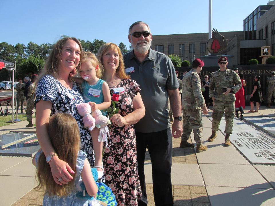 The family of Chief Warrant Officer 2 Shane M. Barnes pose for a photo after a U.S. Army Special Operations Command memorial ceremony Thursday, May 23, 2024, at Fort Liberty. Shown are daughter Amelia, wife Samantha, daughter Katherine, mother Kelly and father Michael.