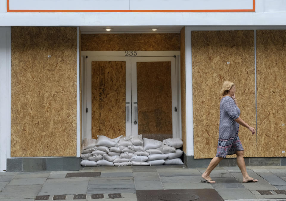 Mostly deserted, much of downtown Charleston, S.C. is boarded up and closed on Thursday, Sept. 13, 2018 in advance of Hurricane Florence. (Matthew Fortner/The Post And Courier via AP)