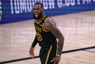 Los Angeles Lakers' LeBron James (23) celebrates during the second half of an NBA conference semifinal playoff basketball game against the Houston Rockets Sunday, Sept. 6, 2020, in Lake Buena Vista, Fla. (AP Photo/Mark J. Terrill)