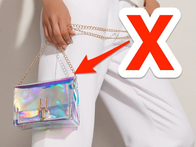 red x and arrow pointing at someone holding a clear plastic purse with oil spill detailing