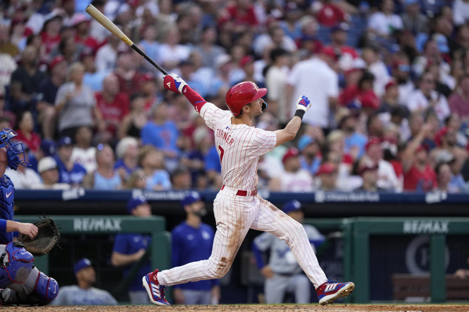 Trea Turner's grand slam opened up the 10-1 blowout as the Phillies struck first in a battle of the NL's best teams.  (AP Photo/Matt Slocum)
