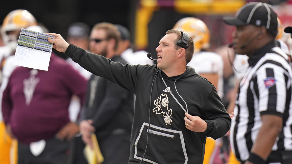 Arizona State head coach Kenny Dillingham shouts to his team during the second half of an NCAA college football game against Utah Saturday, Nov. 4, 2023, in Salt Lake City. (AP Photo/Rick Bowmer)