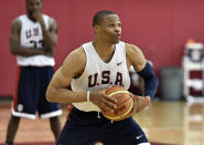 <p>FILE - In this Aug. 11, 2015, file photo, Russell Westbrook looks to pass the ball during the U.S. men’s basketball team’s minicamp in Las Vegas. Westbrook says he won’t play in the Olympics, leaving the U.S. basketball team without another of its best players. The Oklahoma City point guard said Friday, June 10, 2016, that he decided not to play after talking with his family. He didn’t give a reason for pulling out in his statement released through the Thunder. ((AP Photo/David Becker, File)</p>