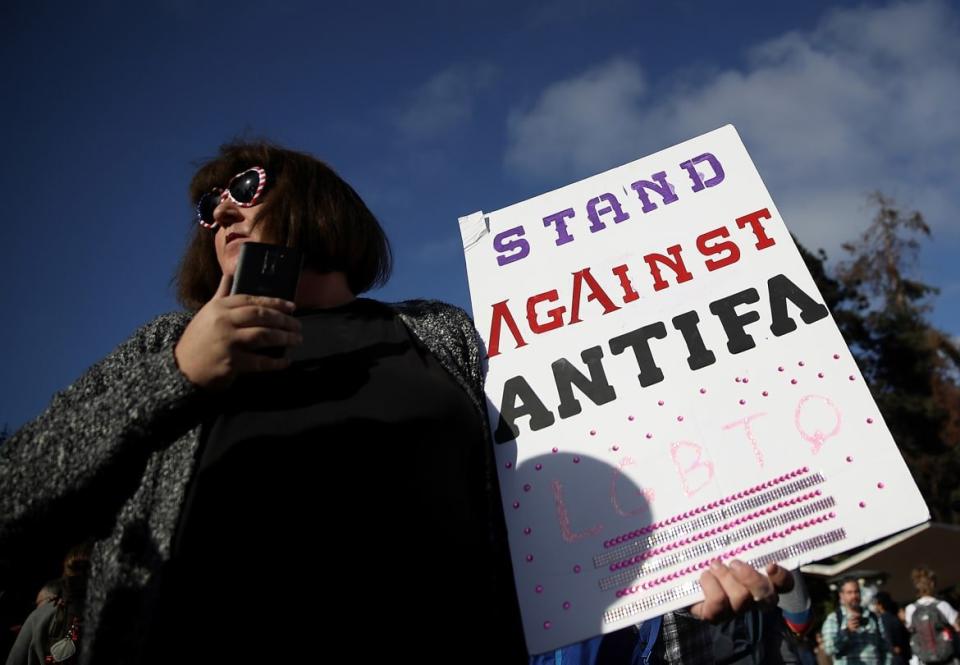 <div class="inline-image__caption"><p>A protester holds a sign during a demonstration outside of Zellerbach Hall on the U.C. Berkeley campus on September 14, 2017 in Berkeley, California. Police are out in force as protesters are assembling outside of Zellerbach Hall at U.C. Berkeley where conservative political commentator Ben Shapiro is scheduled to speak.</p></div> <div class="inline-image__credit">Justin Sullivan/Getty Images</div>