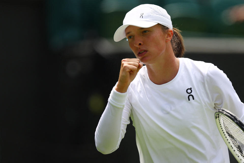 Poland's Iga Swiatek reacts during her first round match against China's Zhu Lin at Wimbledon (Reuters via Beat Media Group subscription)