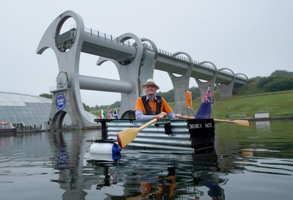 Michael Stanley, known as ‘Major Mick’, with his home-made boat ‘Tintanic II’ at the Falkirk Wheel (Andrew Milligan/PA) (PA Wire)