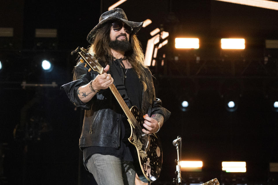 FILE - Billy Ray Cyrus performs during CMA Fest 2022 in Nashville, Tenn., on June 12, 2022. Cyrus filed for divorce from his wife, singer Firerose, whose real name is Johanna Rose Hodges, in a Tennessee court on May 22, 2024, after seven months of marriage. (Photo by Amy Harris/Invision/AP, File)