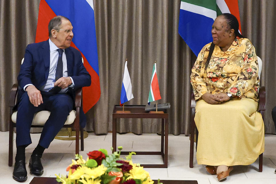 In this photo released by the Russian Foreign Ministry Press Service, Russia's Foreign Minister Sergey Lavrov, left, and his South Africa's counterpart Naledi Pandor, speak, during their meeting in Pretoria, South Africa, Monday, Jan. 23, 2023. (Russian Foreign Ministry Press Service via AP)