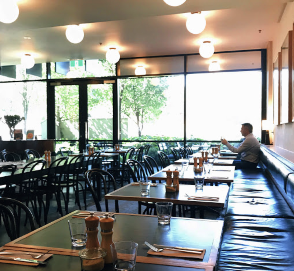 Photo inside Canberra restaurant Muse showing just one person dining.