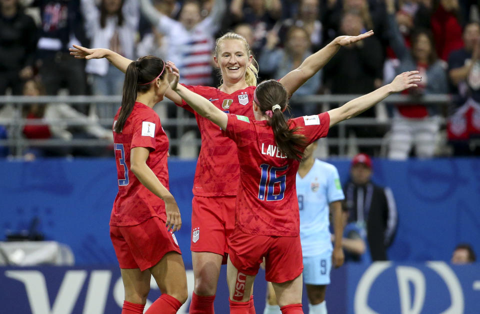 REIMS, FRANCE - JUNE 11: Sam Mewis of USA celebrates a goal with Christen Press, Rose Lavelle during the 2019 FIFA Women's World Cup France group F match between USA and Thailand at Stade Auguste Delaune on June 11, 2019 in Reims, France. (Photo by Jean Catuffe/Getty Images)