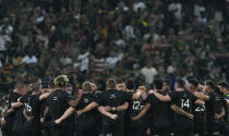 New Zealand's players at the end of the Rugby Championship test between South Africa and New Zealand at Mbombela Stadium in Mbombela, South Africa, Saturday, Aug. 6, 2022. (AP Photo/Themba Hadebe)