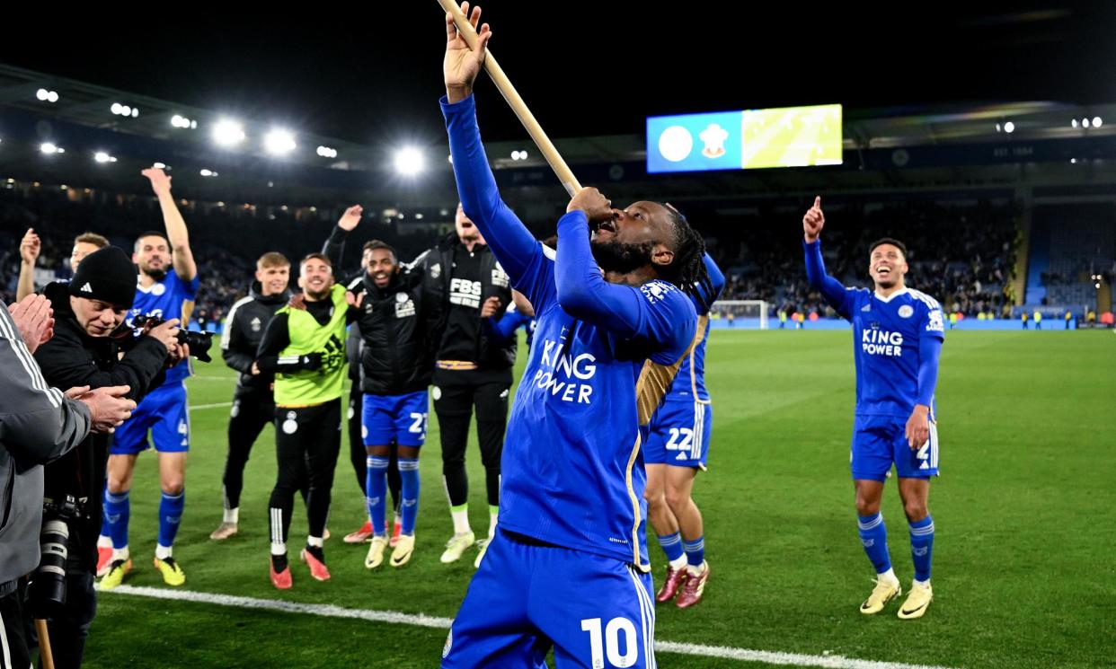 <span>Leicester’s Stephy Mavididi celebrates their win over Southampton in unusual fashion with a corner flag.</span><span>Photograph: Michael Regan/Getty Images</span>