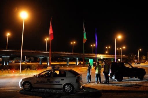 Bulgarian policemen standing guard at the entrance of the Bourgas airport. An explosion ripped through a bus carrying Israeli holiday-makers in Bulgaria and killed at least six people on Wednesday in an attack the government in Israel blamed on arch foe Iran