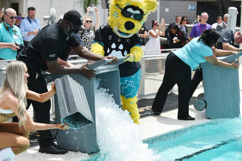 Jaxson de Ville helps cool down the pool with ice ahead of the CEO Soak for ALS Tuesday at TIAA Bank Field.