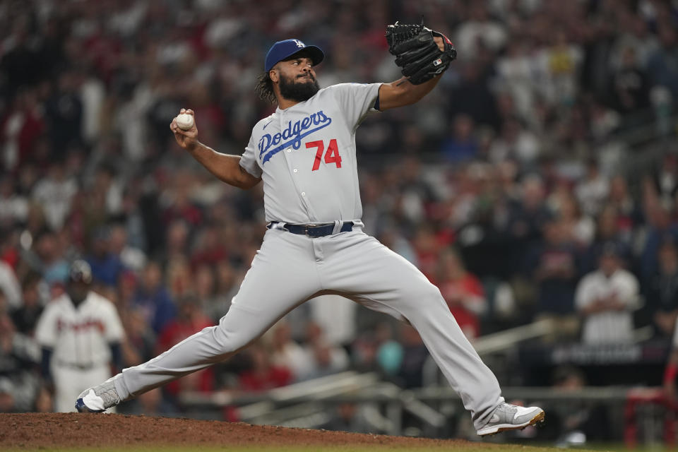 Los Angeles Dodgers pitcher Kenley Jansen pitches against the Atlanta Braves during the eighth inning in Game 6 of baseball's National League Championship Series Saturday, Oct. 23, 2021, in Atlanta. (AP Photo/Brynn Anderson)