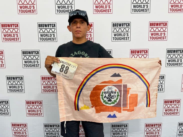 Eli Neztsosie at Badwater check-in with the Navajo Nation flag. (Photo: Robert Lee/Badwater.com)