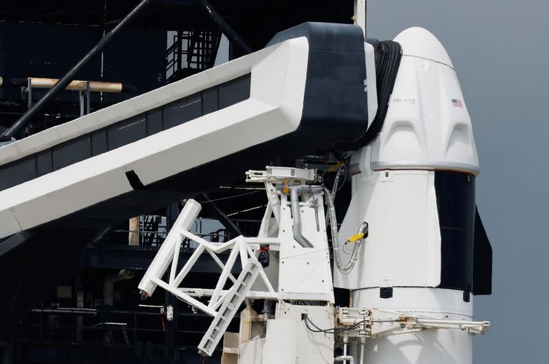 A SpaceX Falcon 9 rocket is shown as it is prepared for another launch attempt for Polaris Dawn, a private human spaceflight mission