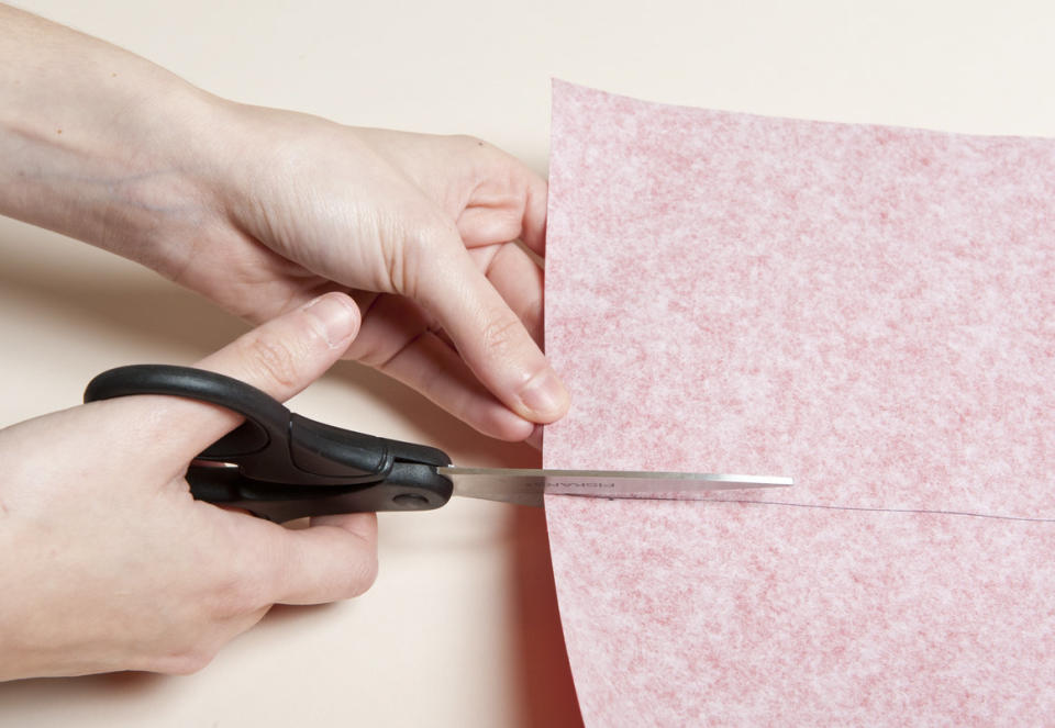 After you've figured out how much paper you'll need, cut the desired amount neatly. 