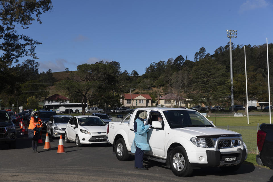 Cars line up at a coronavirus testing pop-up centre. 