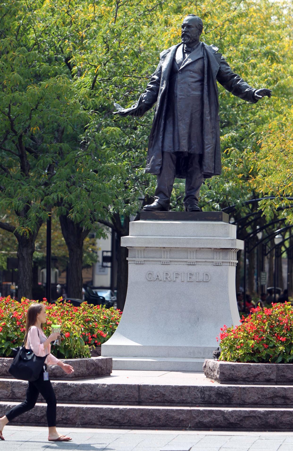 A statue of President James Garfield stands at the east end of Piatt Park near the Main Library. Garfield was assassinated in 1881, and the statue was placed in tribute to the Ohio-born president.