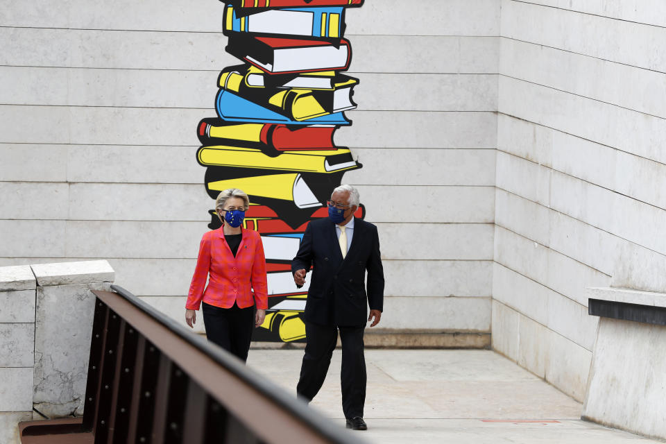 European Commission President Ursula von der Leyen chats with Portuguese Prime Minister Antonio Costa at the Center for Living Science in Lisbon, Wednesday, June 16, 2021. The president of the European Commission has started in Lisbon a tour of some European Union capitals to announce the initial endorsement of their plans for spending the bloc's massive economic recovery fund. (AP Photo/Armando Franca)