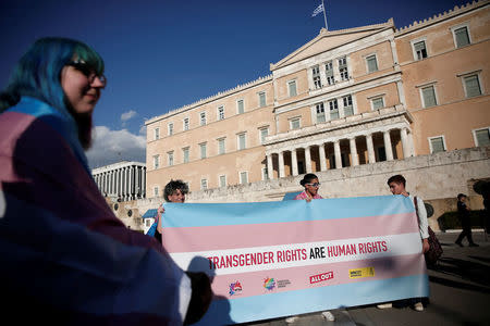 Protesters take part in a demonstration as the Greek Parliament debates bill allowing people to choose legal gender, in Athens, Greece, October 9, 2017. REUTERS/Alkis Konstantinidis