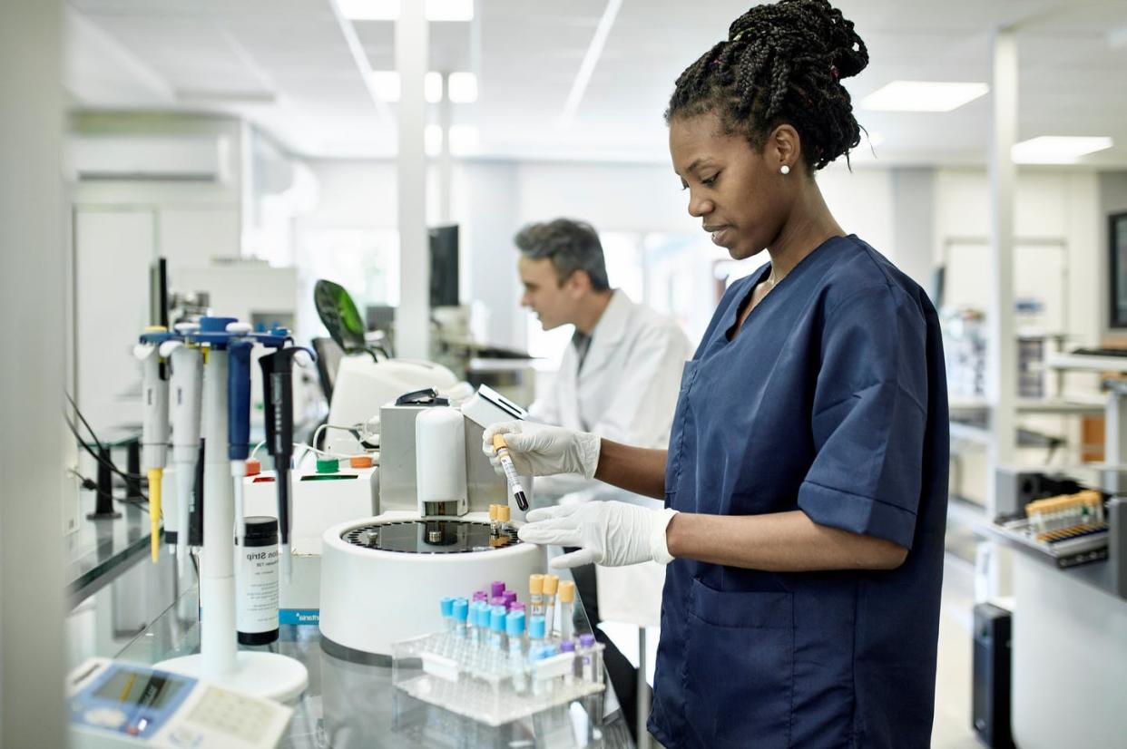 <span class="caption">Thousands of physicians throughout the U.S. rely daily on the critical data provided to them by medical labs.</span> <span class="attribution"><a class="link " href="https://www.gettyimages.com/detail/photo/young-african-female-pathology-technician-working-royalty-free-image/1191114007?adppopup=true" rel="nofollow noopener" target="_blank" data-ylk="slk:xavierarnau/E+ via Getty Images;elm:context_link;itc:0;sec:content-canvas">xavierarnau/E+ via Getty Images</a></span>