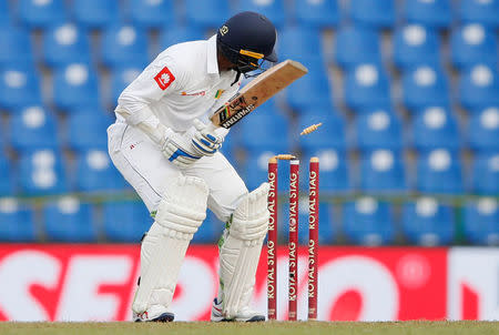 Cricket - Sri Lanka v India - Third Test Match - Pallekele, Sri Lanka - August 13, 2017 - Sri Lanka's Upul Tharanga is bowled out by India's Umesh Yadav (not pictured). REUTERS/Dinuka Liyanawatte